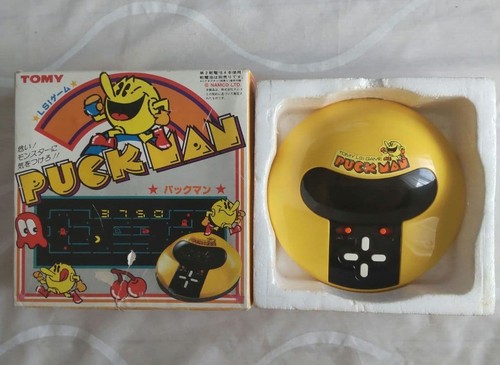 Jeu portable tomy puck - portable,