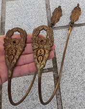 2 Anciennes embrasses / attaches rideaux / crochets mural en Bronze