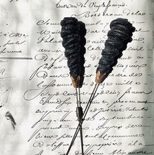 Paire d'aiguilles à chapeau