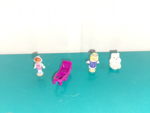 Polly pocket figurine doll