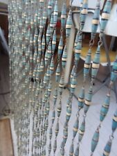 Rideau en perles de papier