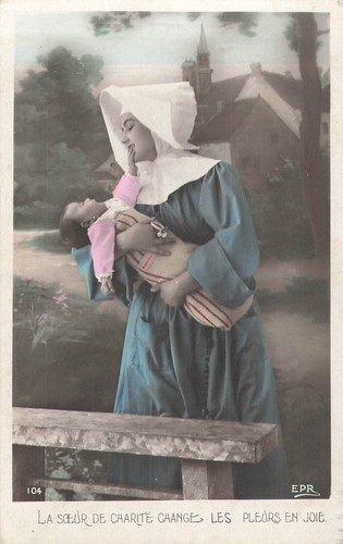 Soeur charite avec bebe - charite,