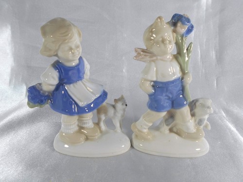 Paire figurine garçon - de,