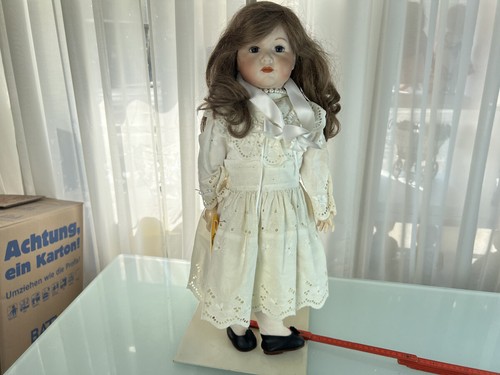 Poupée tête porcelaine - , 62