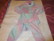 combinaison pyjama à capuche H&M fourrure à tete de licorne 6.7 ans