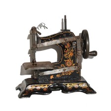 Ancien jouet / petite machine à coudre en métal