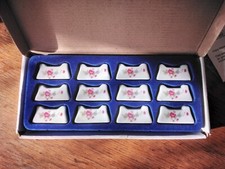 Lot de 12 porte-couteaux