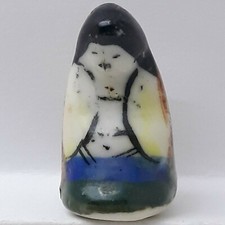 Fève petit santon puce en