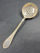 Cuillère saupoudreuse en