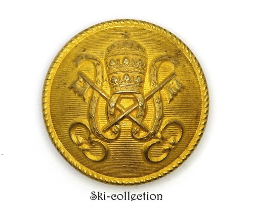 Bouton avec blason du - le,