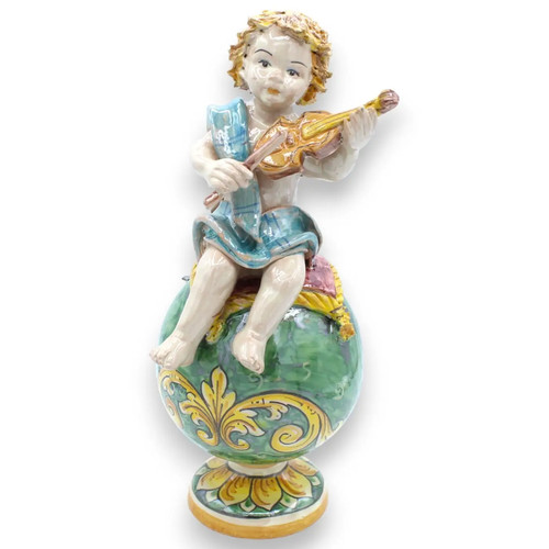 Putto avec violon sur - avec,