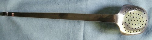 Ancienne ecumoire tout - ancienne,