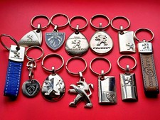 PEUGEOT LOT 12 PORTE CLES LOGO AUTOMOBILE tous différents