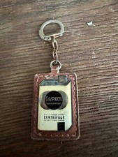 EXCEPTIONNEL ANCIEN PORTE-CLE PETROLIER METAL EMAILLE BIDON GRAPHOCYL CENTRIFUGE