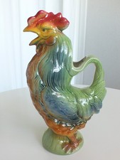 Resplendissant pichet au coq