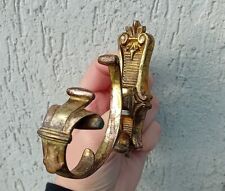Ancienne embrasse / attache rideaux / crochet mural en Bronze