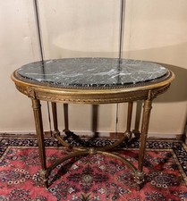 Table guéridon style Louis XVI en bois doré