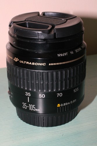 Zoom canon 105 - zoom,