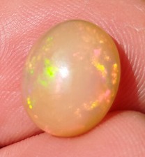 3.20cts Opale caramel naturelle d'Ethiopie feu multicolor