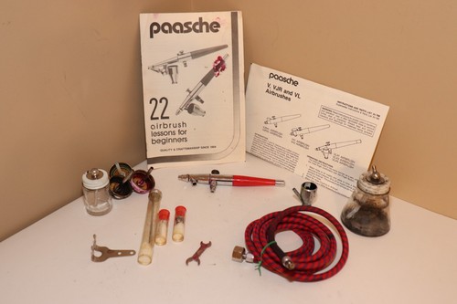 Vintage paasche dual - dual, action