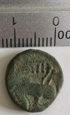 PIÈCE DE MONNAIE ROMAINE AS A IDENTIFIER 