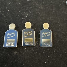 Pin's PARFUM Retiens La Nuit de JOHNNY HALLYDAY 3 Différents