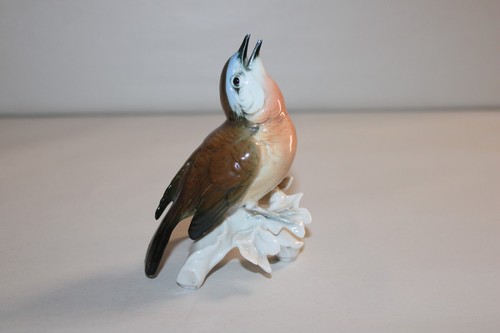Figurine oiseau fauvette en - ?,