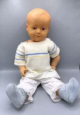 Baigneur Petitcollin Tête d’Aigle 60 cm – celluloïid ancien, yeux bleus, tricot