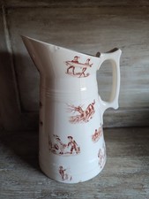 Pichet en faïence de Luneville Keller et Guérin modèle Polichinelle  début XXème