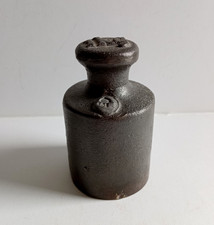 Poids de 1kg ancien en fonte