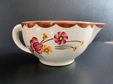 Jolie saucière en porcelaine