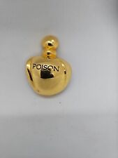 Broche Christian Dior « Parfum Poison"metal doré. 