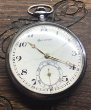 HELVETIA vers 1940 en acier chromé -Aiguilles Breguet-État fonctionnel-