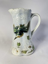 Pichet ancien barbotine hirondelle nénuphars faïence Saint Clément