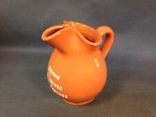 Ancien pichet parlant en terre