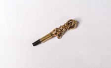 Clé de montre or massif 18