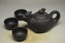 Théière fait mains par