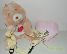 Peluche BISOUNOURS sac à dos