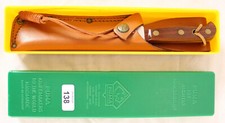 Ancien couteau de chasse PUMA 12 6390, manche jaracanda, 1990, étui et boîte d'o