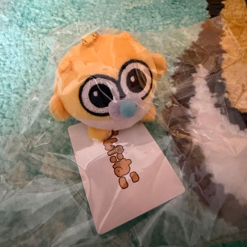 Peluche mascotte bébé caca