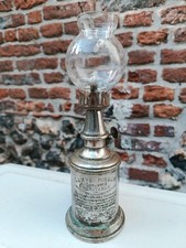Ancienne lampe argentée à
