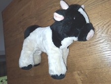 Doudou vache noire et blanche