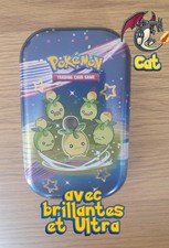 mini tin pokemon + 100 cartes avec brillantes + 1 ultra