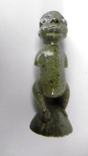 statuette type grenouille