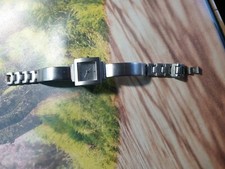 montre femme bracelet métal blanc avec pile neuve