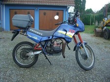 Axe roue arrière, porte couronne, silent bloc, et tendeurs  Peugeot XPLC 50