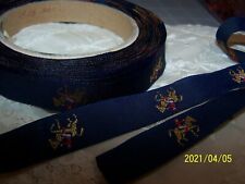 Ancien ruban. Décor chevaux au fil de soie. Bleu marine. Vendu au mètre. N°151