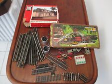 RAILS ET PIÉCES POUR TRAINS HO.