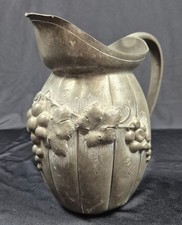 Ancien pichet en étain signé