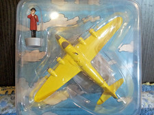 EN AVION TINTIN.  5)